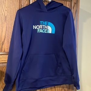Woman’s north face sweatshirt